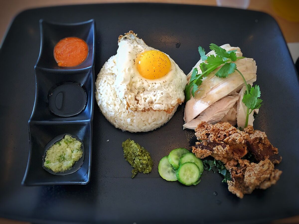Hainanese Chicken Rice, with fried egg and buttermilk fried chicken skin