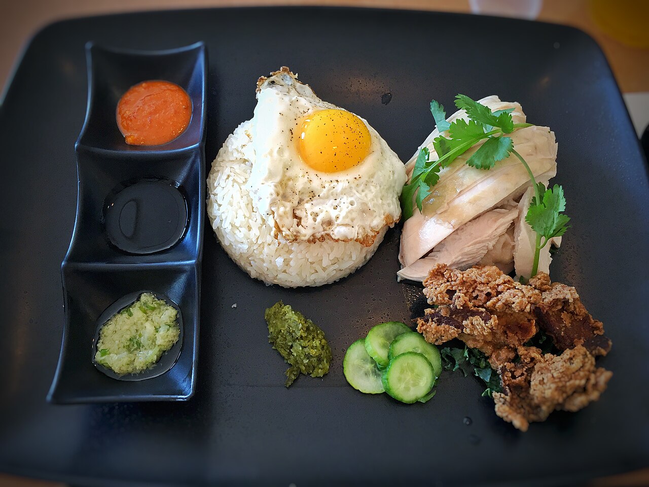 Hainanese Chicken Rice, with fried egg and buttermilk fried chicken skin