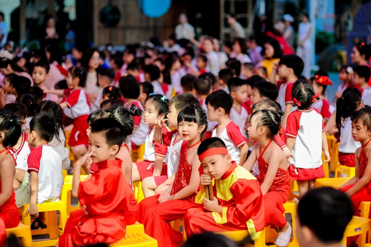 Bright and colorful children's festival in Ha Noi, showcasing kids in vibrant traditional attire.