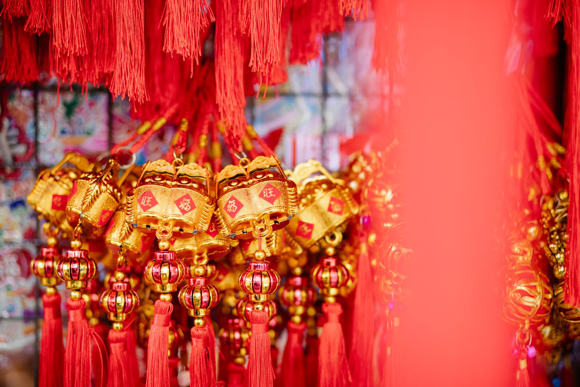 Collection of red and golden Chinese hanging decorations with hieroglyphs for New Year celebration
