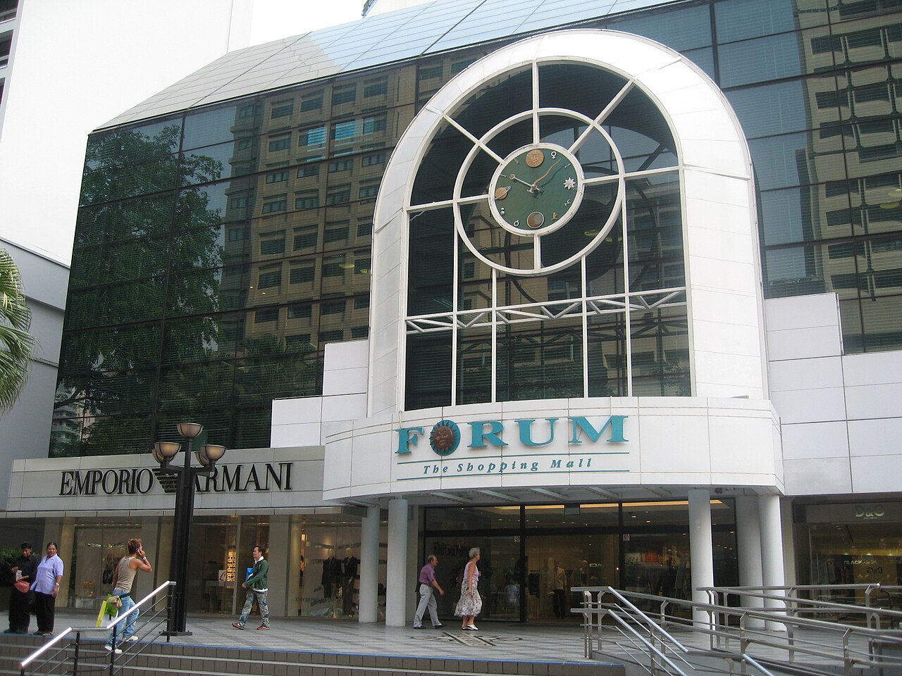 Main entrance of Forum The Shopping Mall featuring the arched clock facade and Forum signage