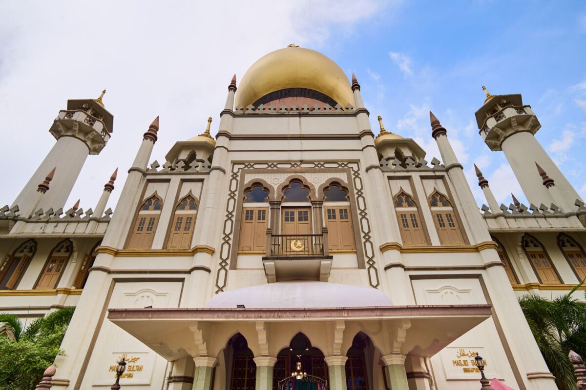 Stunning view of Sultan Mosque with its iconic golden dome and detailed architecture in Singapore.