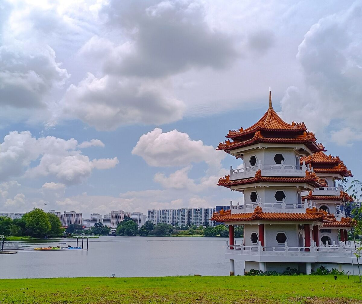 Twin Pagodas beside Jurong Lake with the city skyline in the background at Jurong Lake Gardens, Singapore