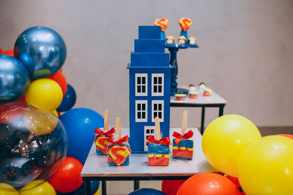 Vibrant party setup with colorful balloons and candy decorations, perfect for celebrations