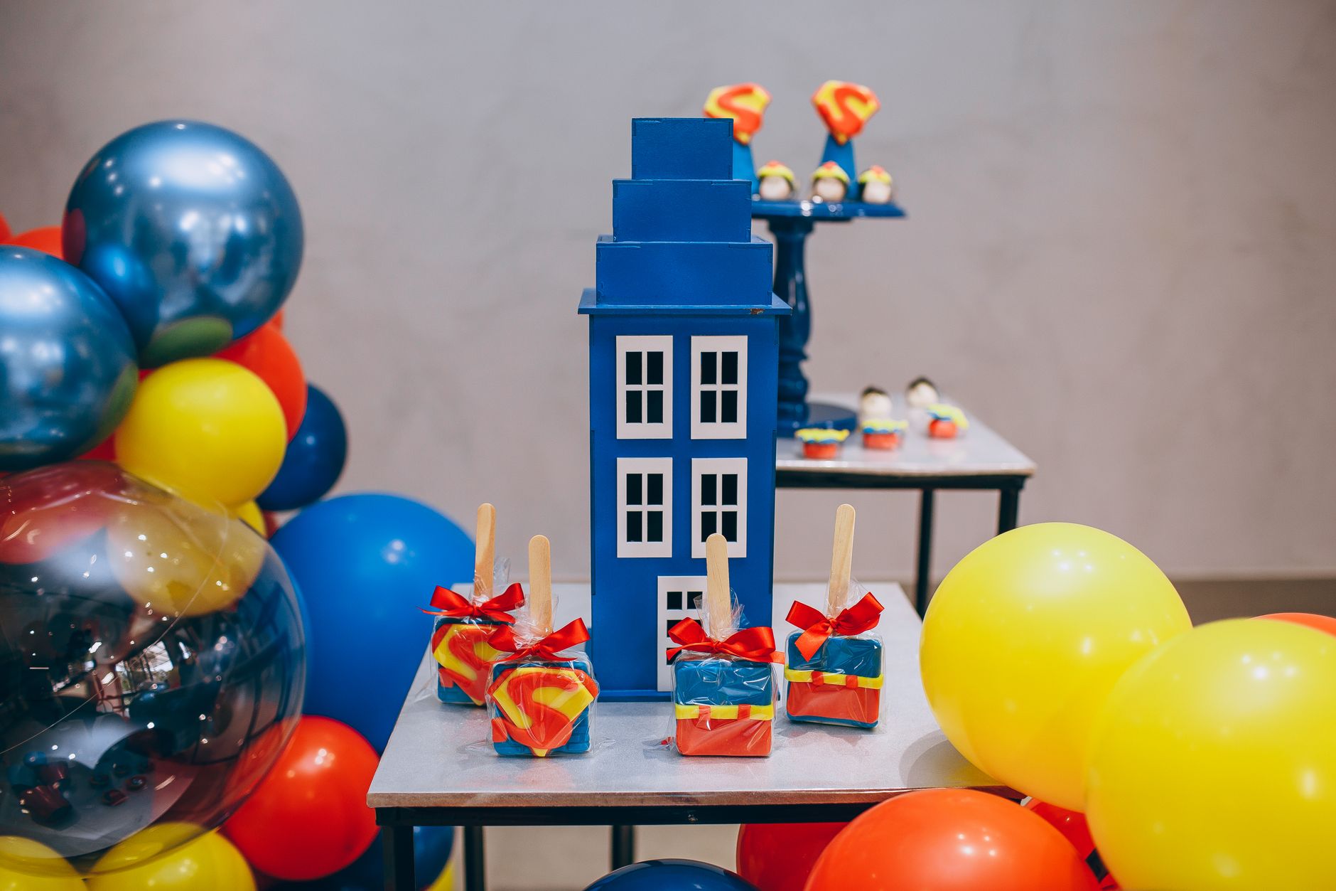 Vibrant party setup with colorful balloons and candy decorations, perfect for celebrations