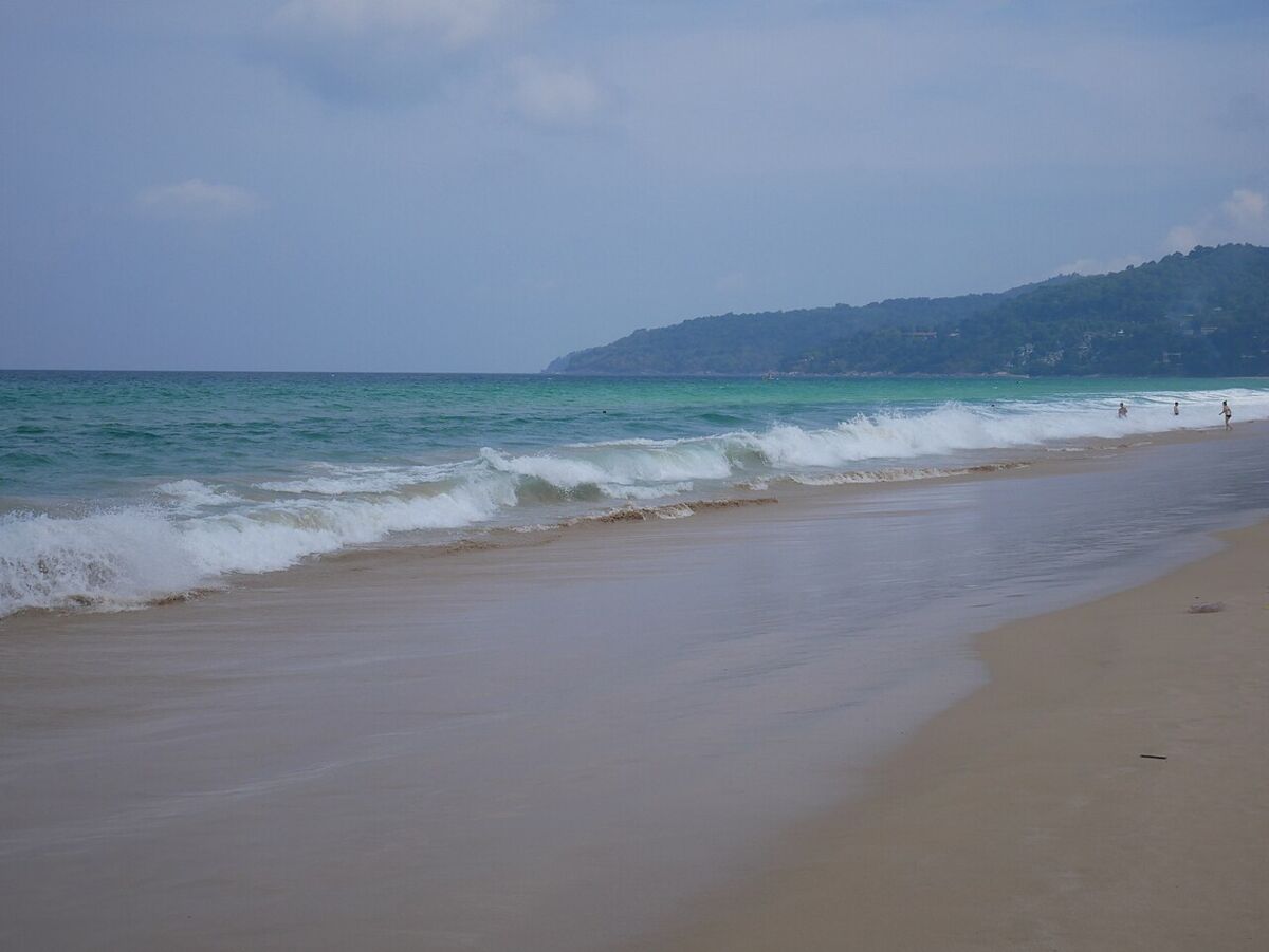 The long sandy sweep of Karon Beach in Phuket, Thailand