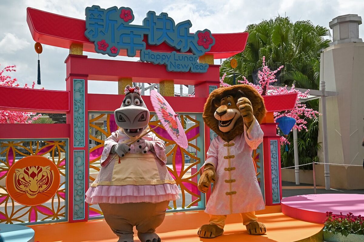 Madagascar character mascots Gloria and Alex in costume at a Lunar New Year display at Universal Studios Singapore